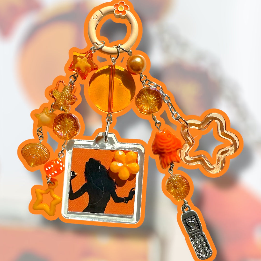 orange ipod dance keychain