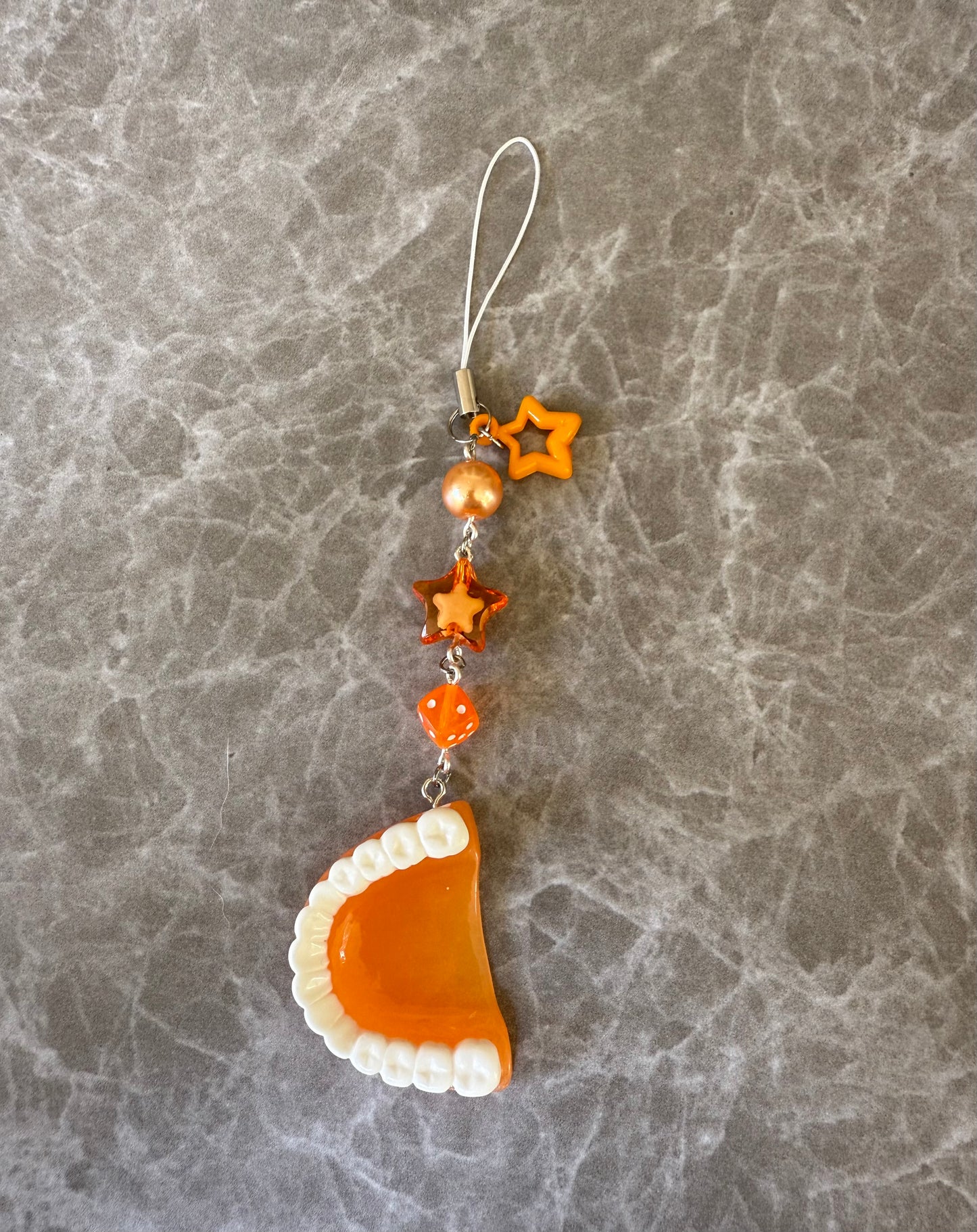 funky teeth phone charms
