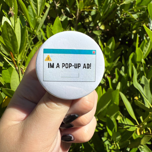 "im a pop-up ad!" button pin